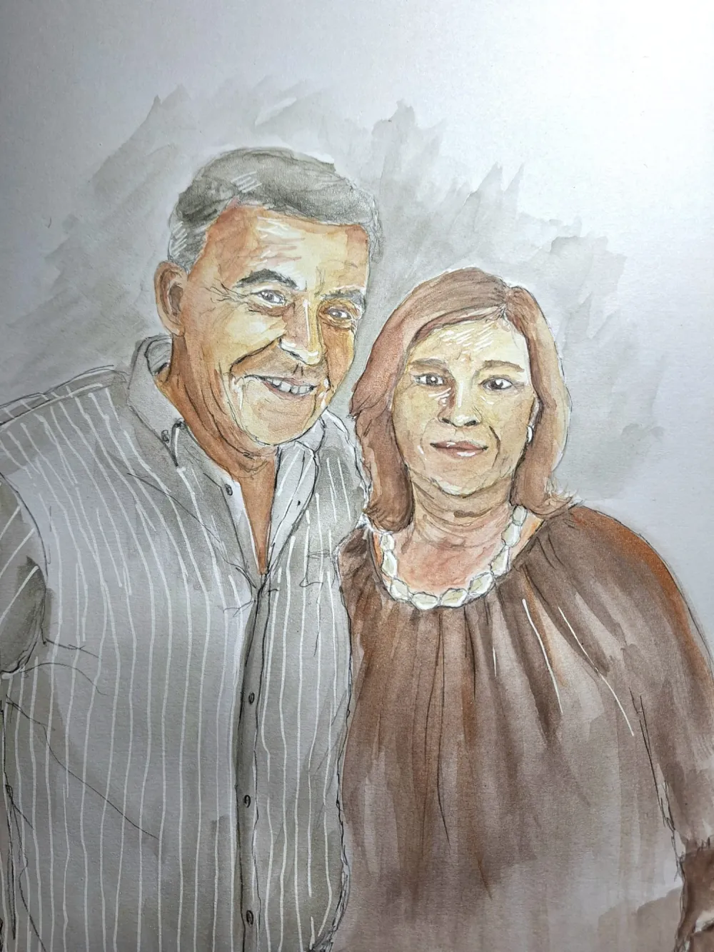 Retrato a aguarela de um casal sorridente