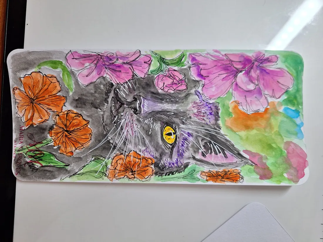 Marcador de livros com um gato e flores