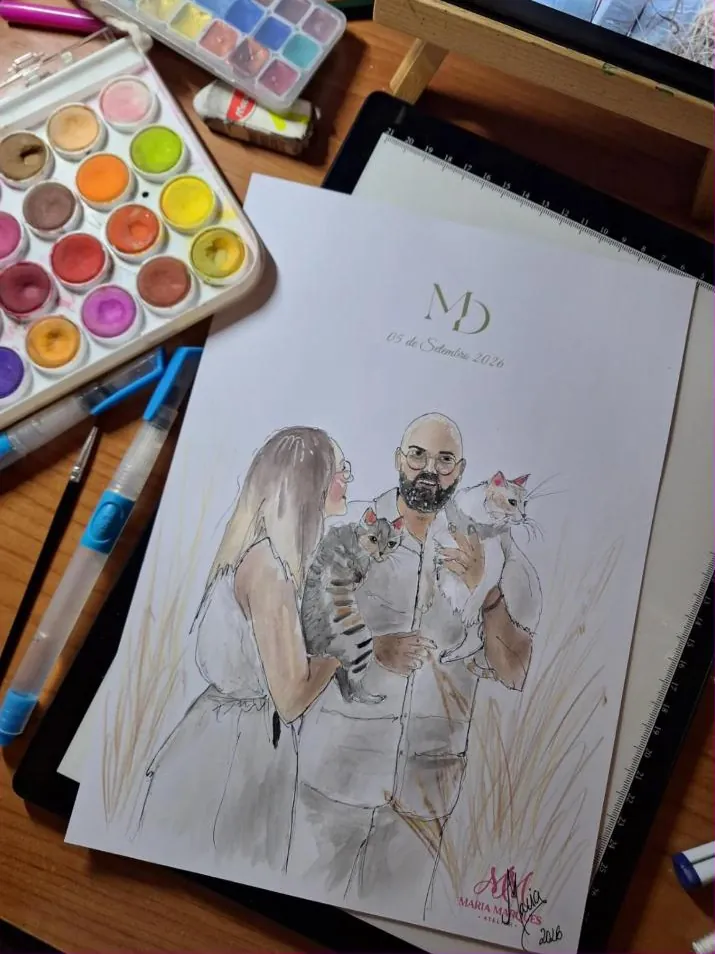 Ilustração do casal pousada ao lado das aguarelas