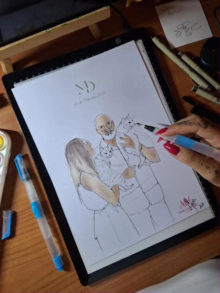 A ilustração do casal a ser pintada numa mesa de luz